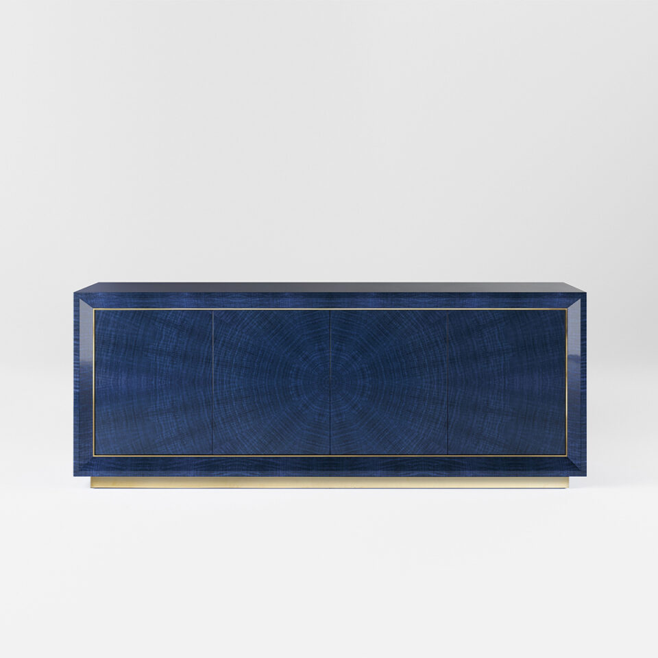 A four door sideboard finished in a high gloss Figured Blue Eucalyptus with a polished brass plinth and trim. Design by DAVIDSON London.