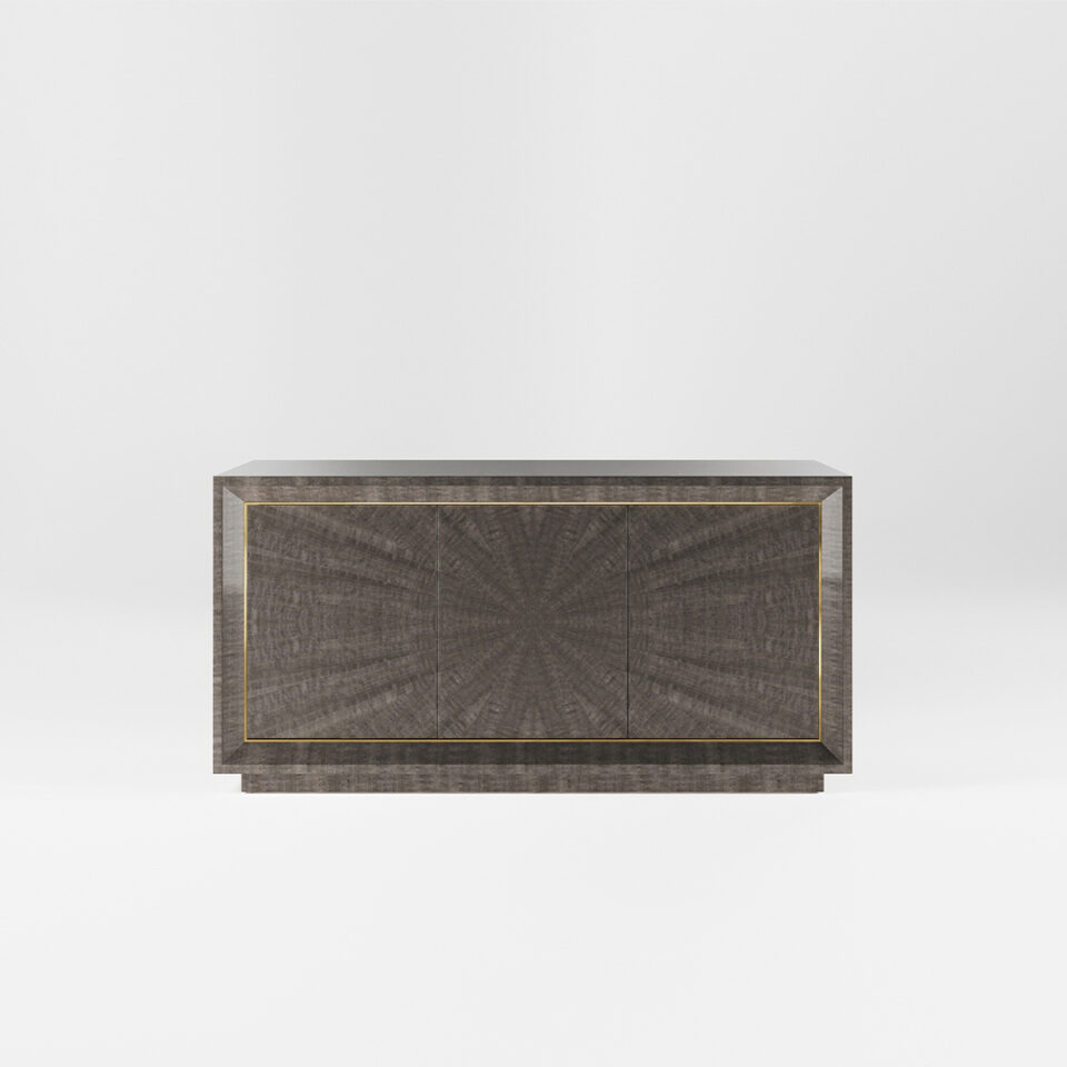 A three door sideboard finished in a high gloss Pebble Grey Anegre with a polished brass trim. Design by DAVIDSON London.