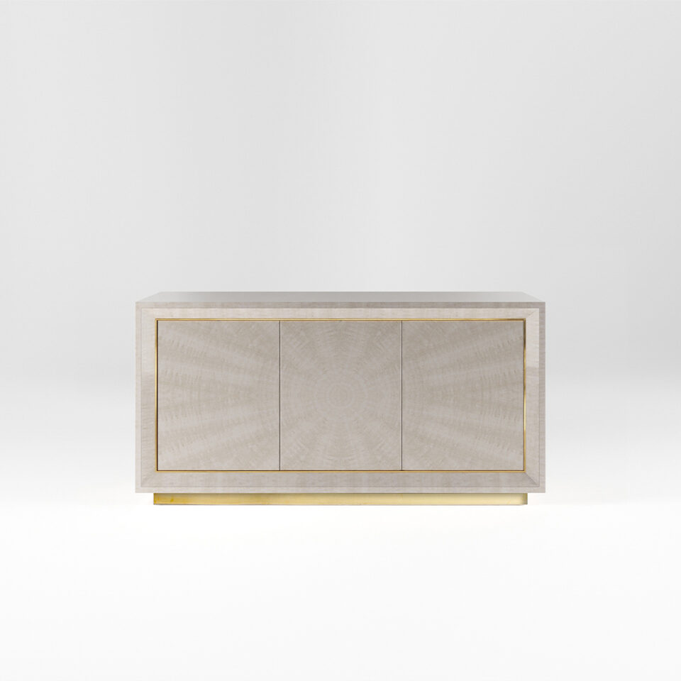 A three door sideboard finished in a high gloss Sycamore Silk with a polished brass plinth and trim. Design by DAVIDSON London.