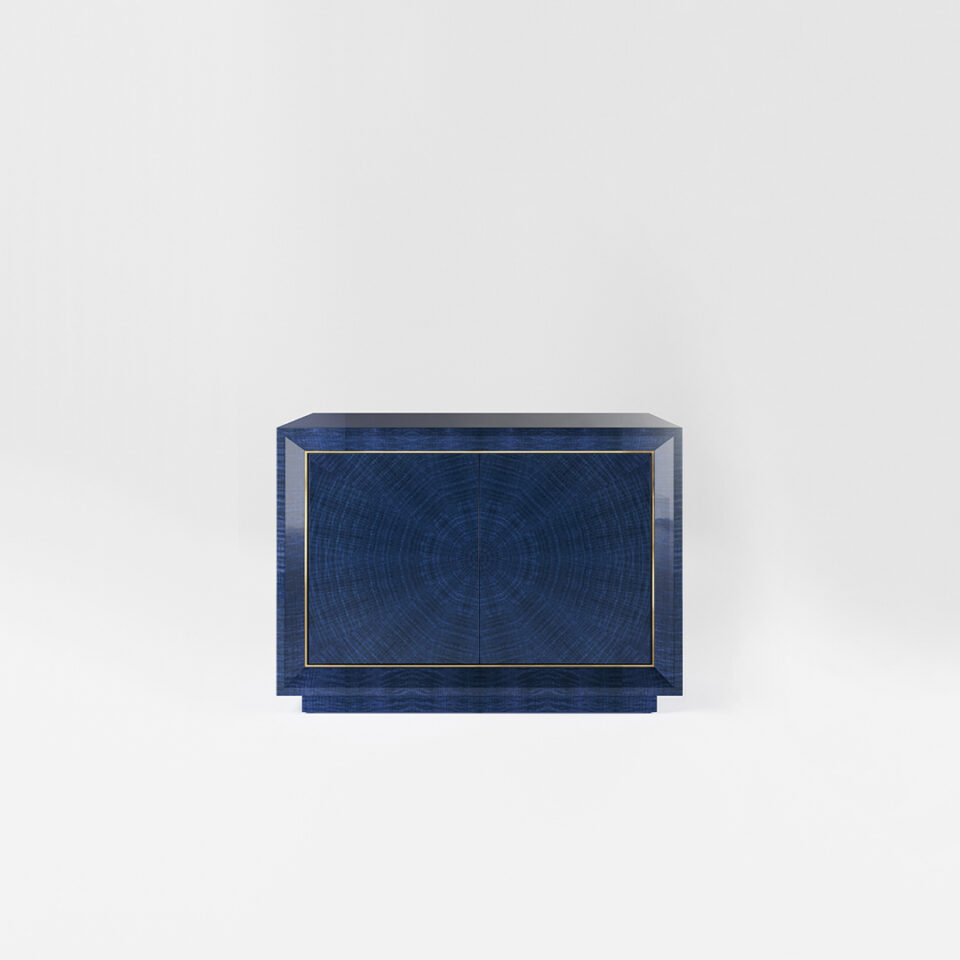 A two door sideboard finished in a high gloss Figured Blue Eucalyptus with a polished brass trim. Design by DAVIDSON London.