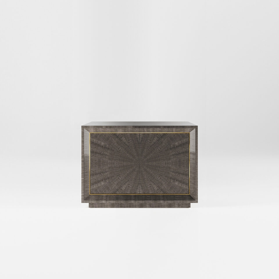 A two door sideboard finished in a high gloss Pebble Grey Anegre with a polished brass trim. Design by DAVIDSON London.