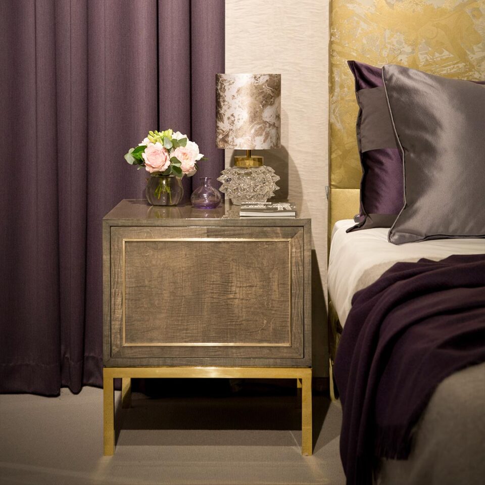 The Dahlia Bedside Chest in a grey sycamore dusk with brush brass trim. Furniture and Interior Design by DAVIDSON London