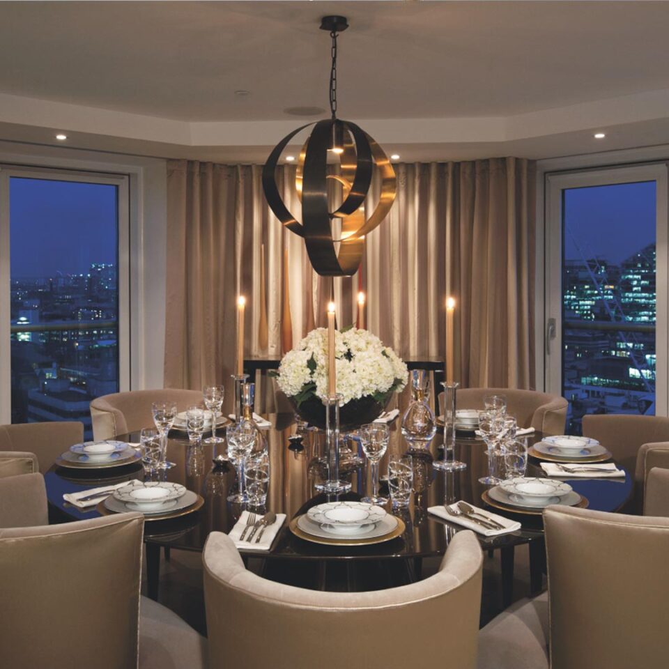 A stunning dining or centre table of contemporary design that will transform any interior with its sleek slimline top and chic silhouette. Geometrically intriguing with the contrasting curves of the spherical top and conical base, shown here in a sublime bronze finish.