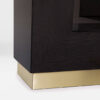 The Hamilton Dining Table Pedestal finished in a dark tinted oak with a smart brushed brass trim