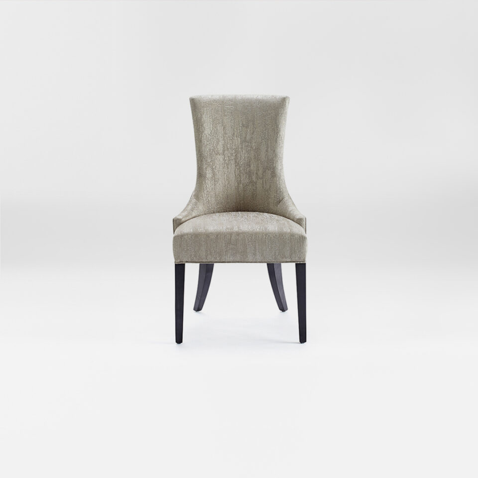A luxury Dining chair with a high back. Upholstered in a soft silver fabric with satin tinted beech legs. Design by DAVIDSON London. Front view.