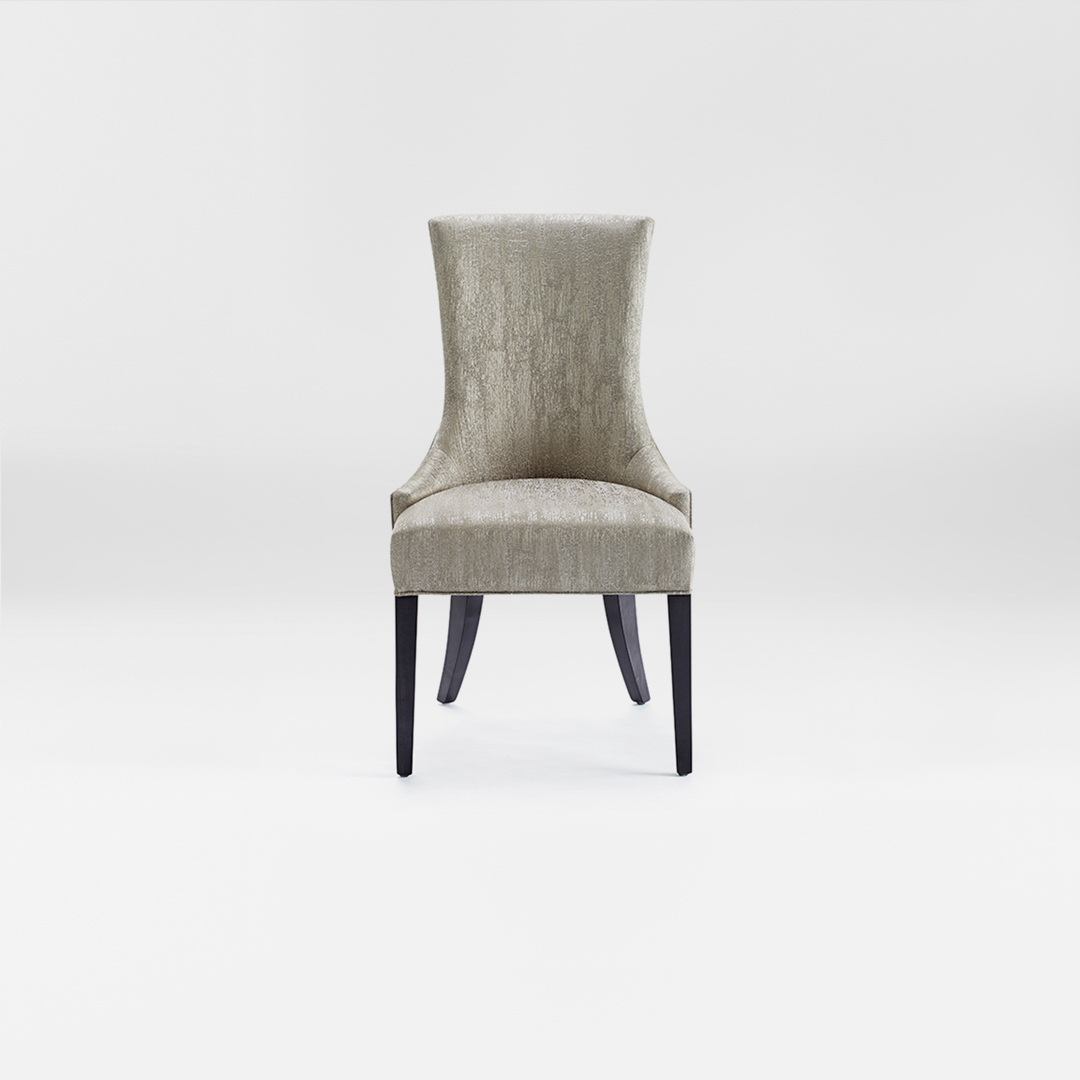 A luxury Dining chair with a high back. Upholstered in a soft silver fabric with satin tinted beech legs. Design by DAVIDSON London. Front view.