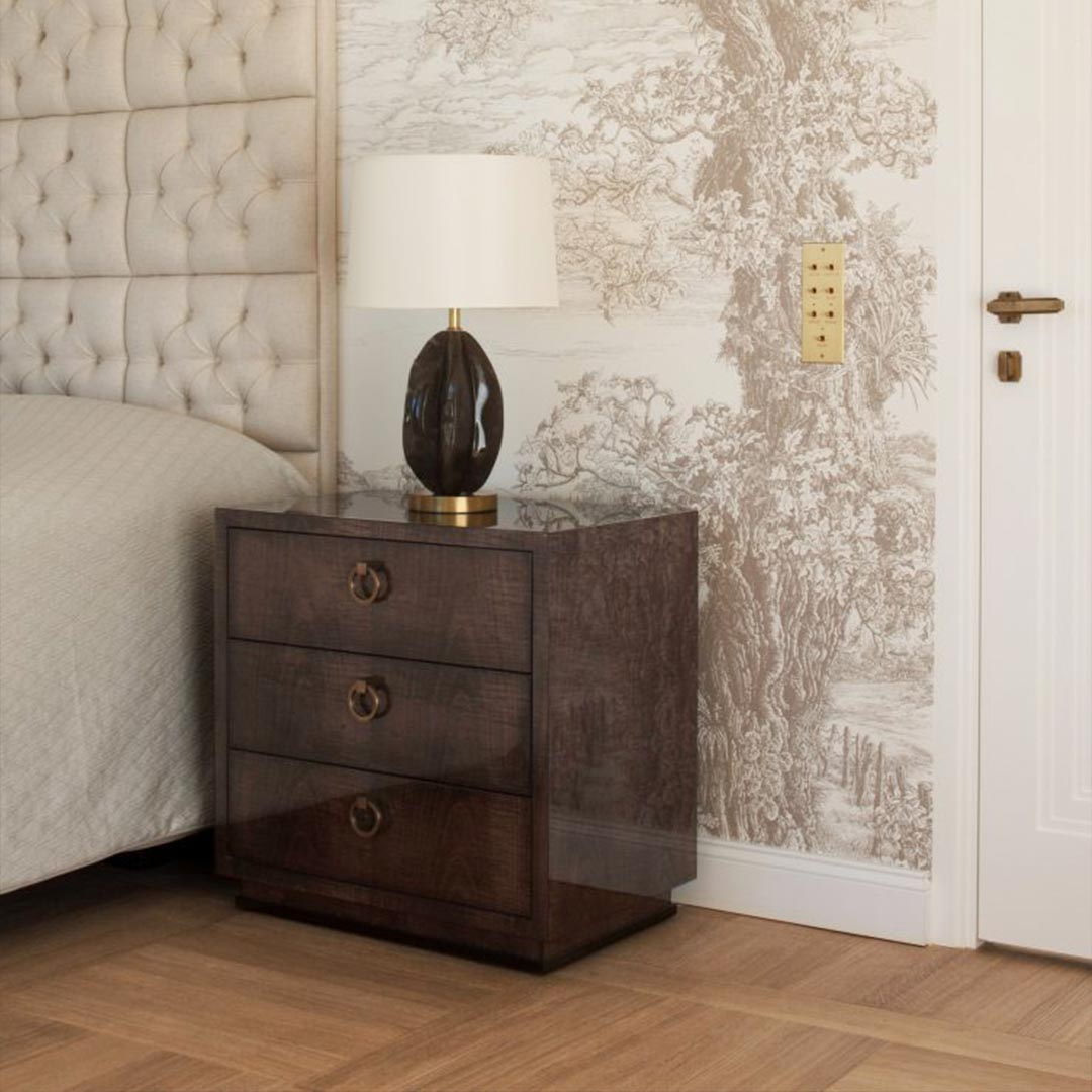 The Hatfield Bedside Chest in High Gloss Sycamore Grey with Round Antiqued Brushed Brass Handles. Interior Design by Davide Rizzo.
