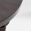 A closeup detail of the Hester radial pattern tabletop in a high gloss Macassar Ebony.