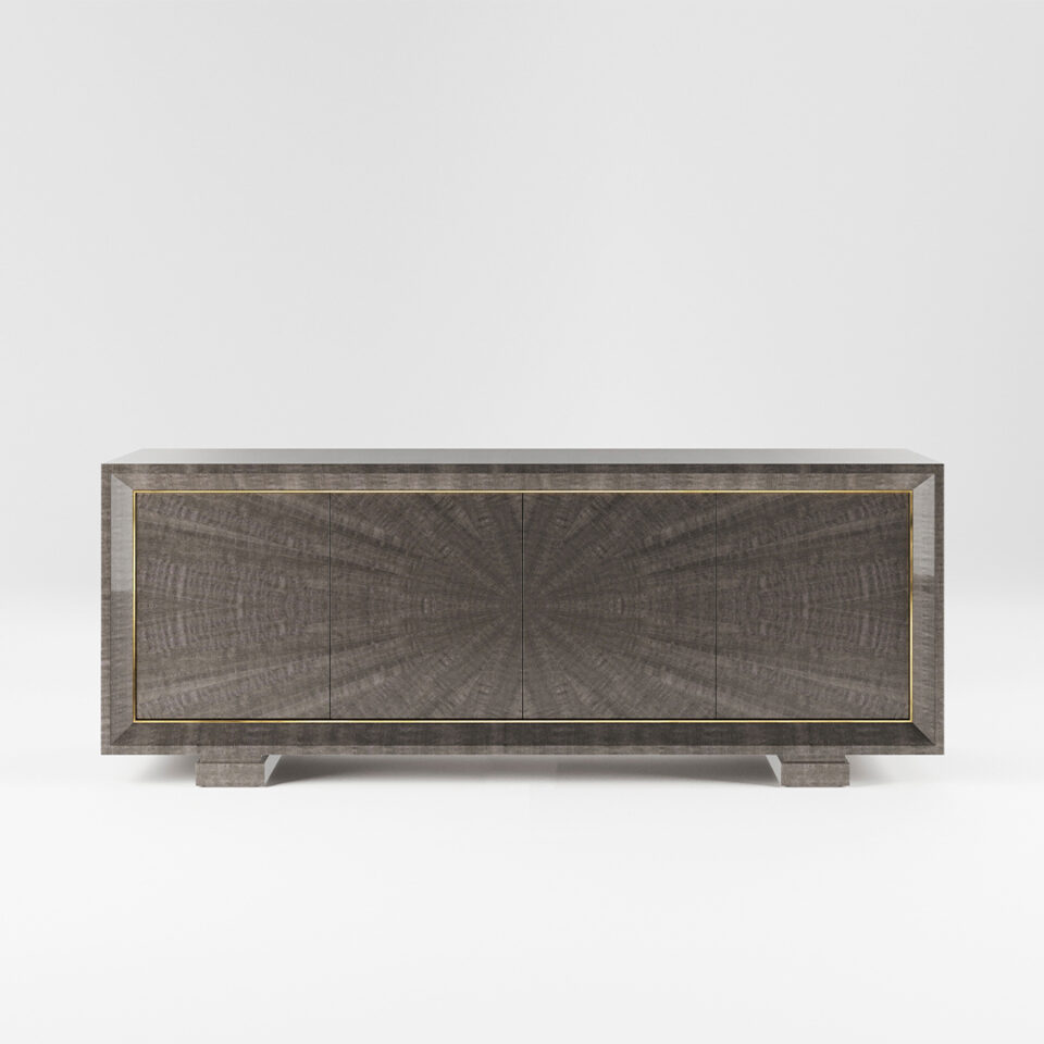 A four door sideboard finished in a high gloss pebble grey anegre with a polished brass trim. Design by DAVIDSON London.