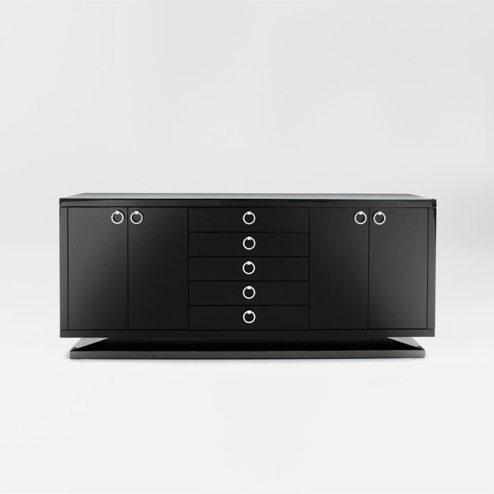 A four door sideboard with a central bank of doors. Finished in a black lacquer with polished nickel handles. Design by DAVIDSON London.