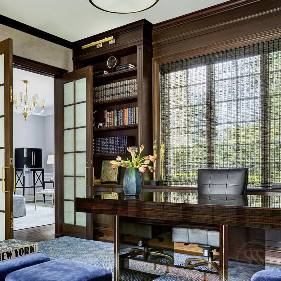 A sleek desk with a long slender top supported by two pedestal legs shown here in rich tones of high gloss macassar ebony with luxurious polished brass highlights. Both legs have a polished brass inlay that matches that of the handles, a small but divine finishing touch. Interior design by Smiros & Smiros