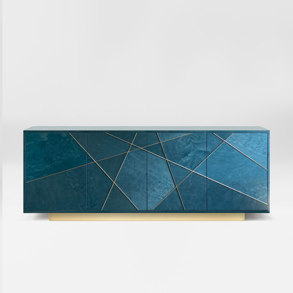 The Four Door Oblique Sideboard in Blue Maplewood with brushed brass plinth and trim
