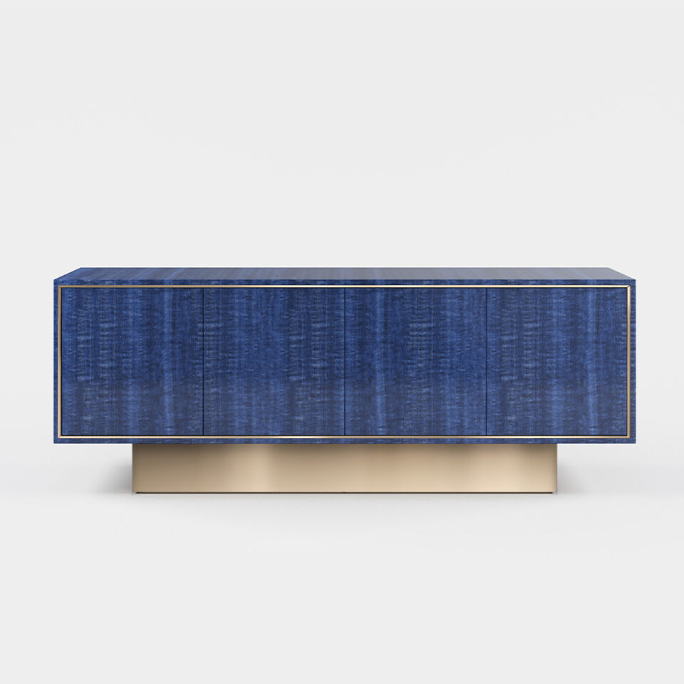 A four door sideboard finished in high gloss figured blue eucalyptus with a polished brass plinth. Design by DAVIDSON London