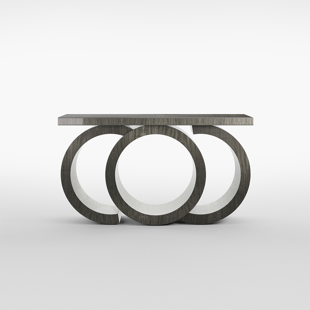 An mesmerising console table of graceful curves. Finished in a high gloss Pebble Grey Anegre with a unique pedestal consisting of various arcs and a defiant central cylinder.
