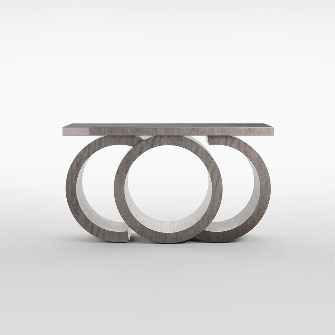 An mesmerising console table of graceful curves. Finished in a high gloss Sycamore Slate with a unique pedestal consisting of various arcs and a defiant central cylinder.