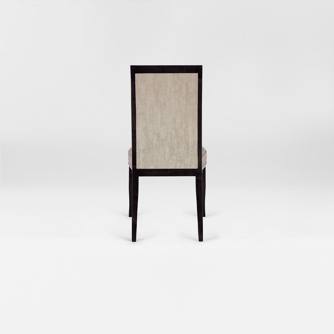 A luxury DAVIDSON London Dining chair with a tall back. Upholstered in a soft champagne metallic fabric with satin tinted beech legs. Back view.