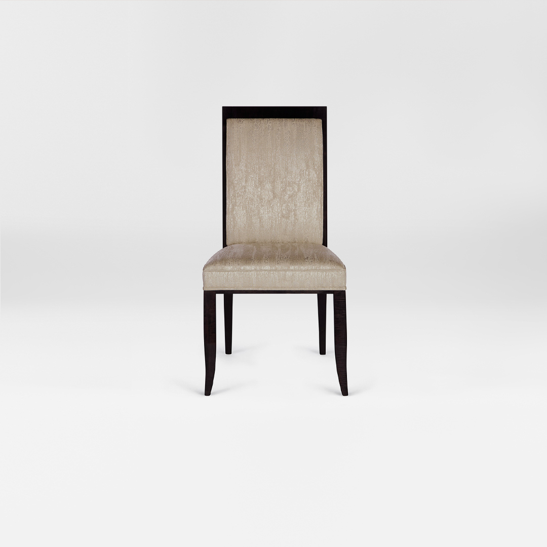 A luxury DAVIDSON London Dining chair with a tall back. Upholstered in a soft champagne metallic fabric with satin tinted beech legs. Front view.