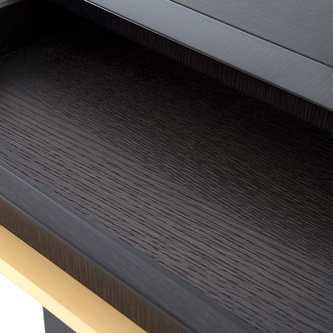 A smart, sleek office solution with ample storage finished in an exquisite satin dark tinted oak with rectilinear handles in brushed brass