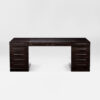 A smart, sleek desk finished in an exquisite sycamore black with ebonised rectilinear handles. Design by DAVIDSON London