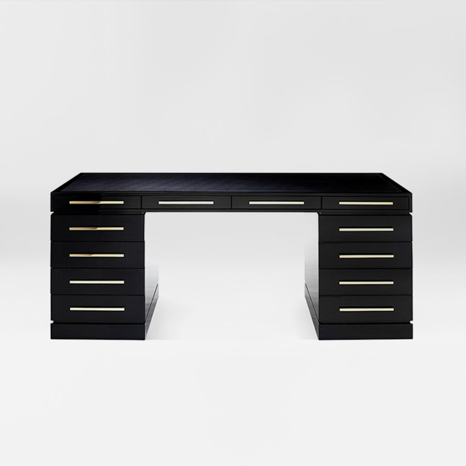A smart, sleek desk finished in an exquisite sycamore black with rectilinear handles in polished brass. Design by DAVIDSON London