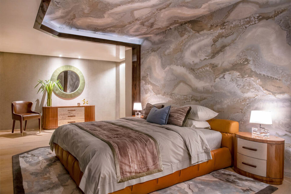 The primary bedroom in this luxury Bangkok Penthouse. Featuring a custom variation of Davidson's Winkworth Bedside Table, and a matching chest of drawers. Finished in a natural Walnut, with distressed White Gold leaf drawers.