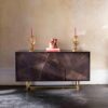 The three door Abstract sideboard in sycamore black with polished brass details