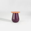 The Wanderlust Lounge table by Davidson London. Finished with a purple Provence top and a green Wales base. Finished with a bright orange top and a deep plum base