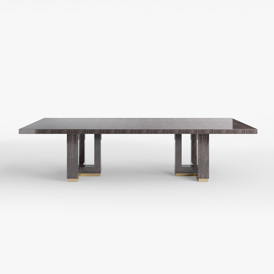 This large rectangular dining table is sure to impress offering unparalleled luxury to any dining room. The table stands on a stylish and elegant cruciform base offering contemporary character and charisma. Finished here in a sleek pebble grey anegre