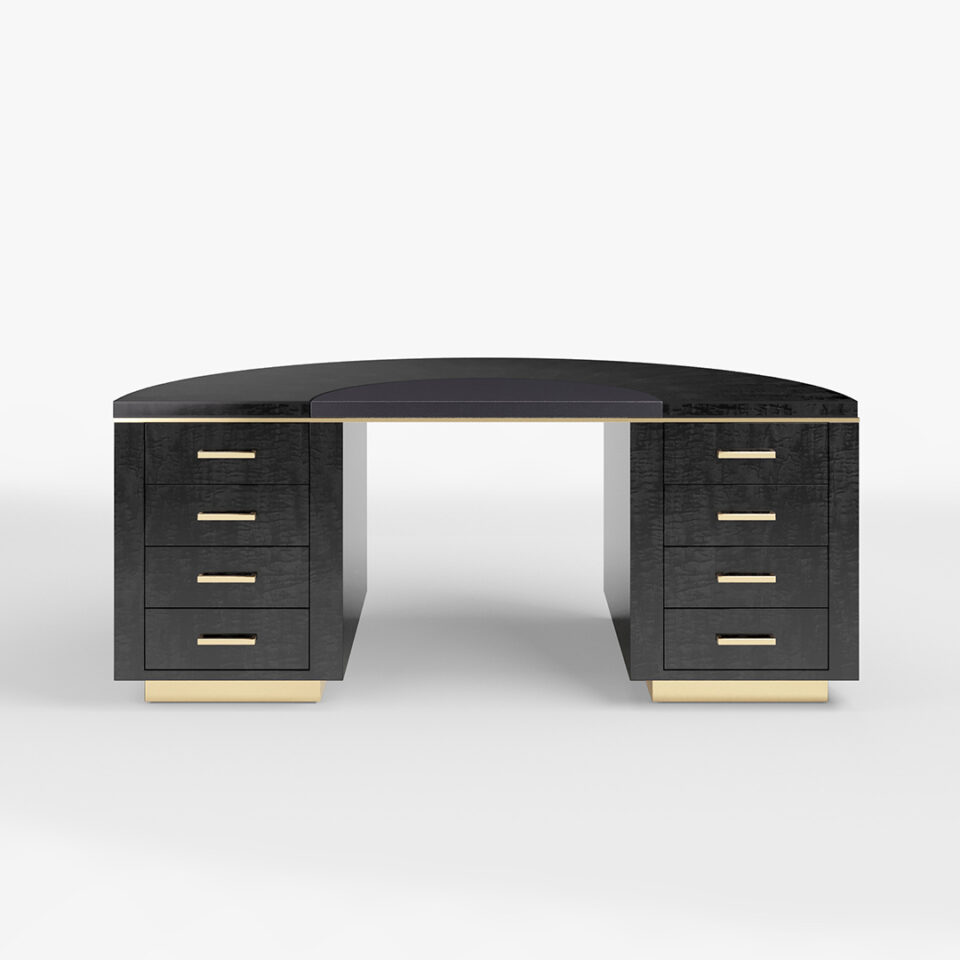 Taking its cues from the iconic Art Deco period of the 1930s, the Lunar Desk exhibits clean and minimal lines combined with an attitude of confidence, luxury, and grace, simultaneously feeling both contemporary and classic. Finished here in a signature Davidson Sycamore Black.
Taking its cues from the iconic Art Deco period of the 1930s, the Lunar Desk exhibits clean and minimal lines combined with an attitude of confidence, luxury, and grace, simultaneously feeling both contemporary and classic. Finished here in a signature Davidson Sycamore Black.