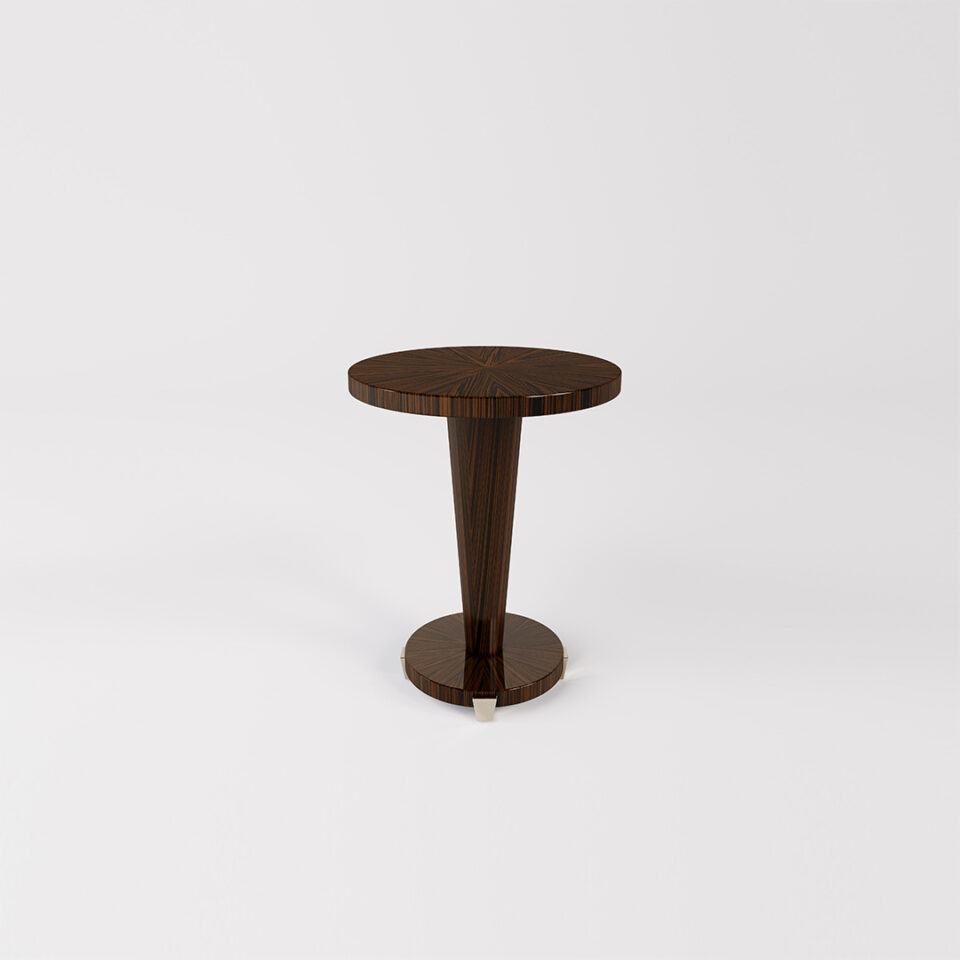 The Stanford Occasional table has a striking radial pattern to the tabletop and base, Its circular top sits on a smooth, tapered pedestal that stands on a circular base. Finished here in a smart shade of macassar ebony