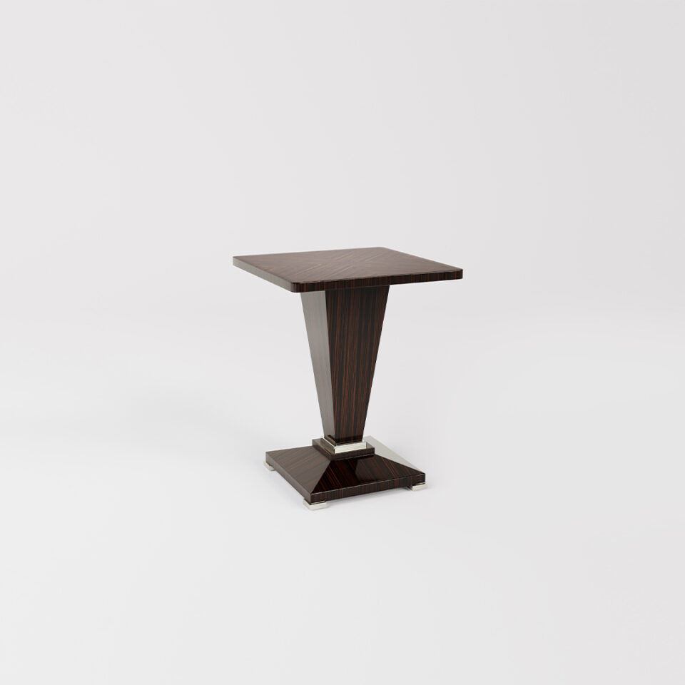 The Winnington is a handsome square table top that sits on a square, tapered pedestal base, with an elegant stepped detail, all standing on a facetted base. Finished here in a smart shade of macassar ebony.