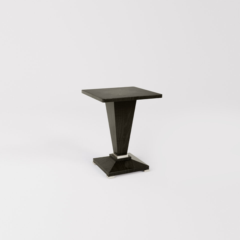 The Winnington is a handsome square table top that sits on a square, tapered pedestal base, with an elegant stepped detail, all standing on a facetted base. Finished here in a smart shade of sycamore black.