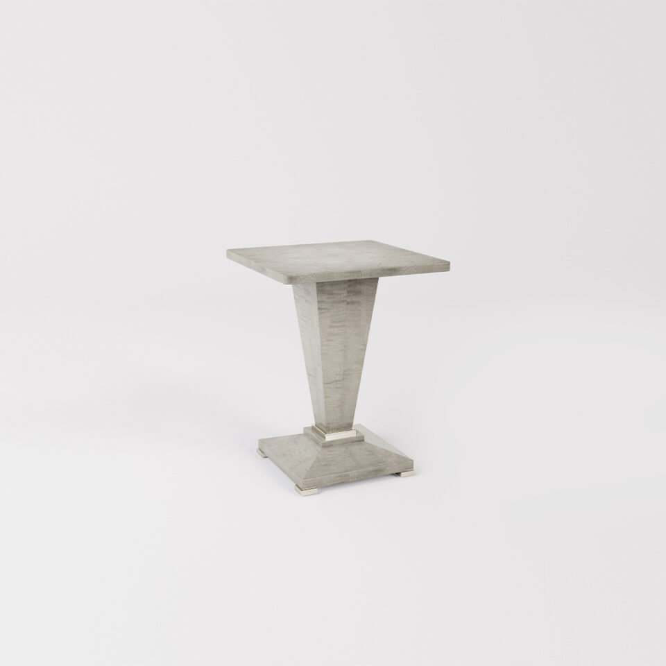 The Winnington is a handsome square table top that sits on a square, tapered pedestal base, with an elegant stepped detail, all standing on a facetted base. Finished here in a smart shade of sycamore pearl.