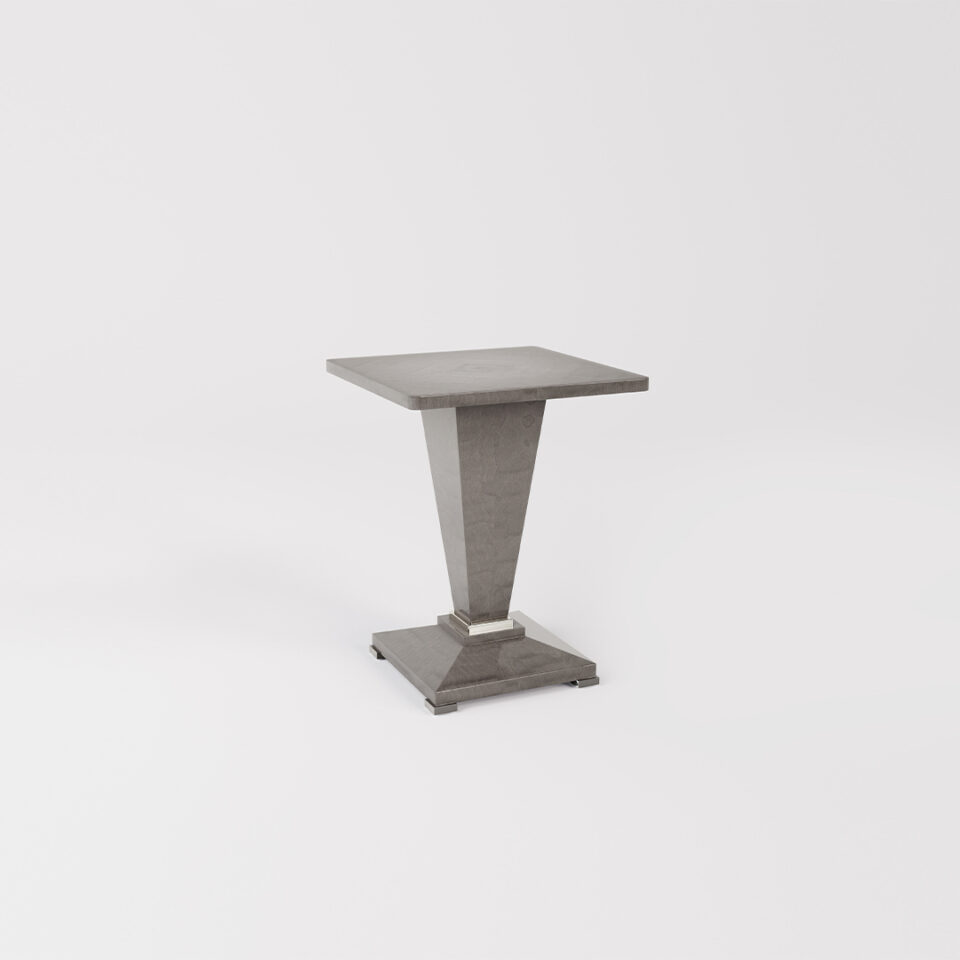 The Winnington is a handsome square table top that sits on a square, tapered pedestal base, with an elegant stepped detail, all standing on a facetted base. Finished here in a smart shade of sycamore slate.