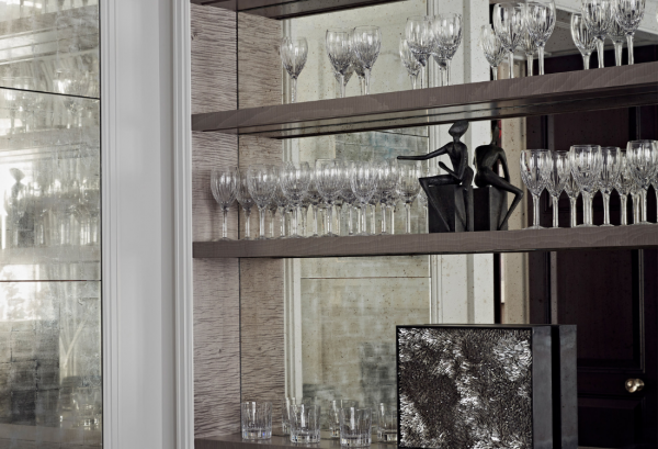 Luxury home bar drinks cabinet with antique decorations.